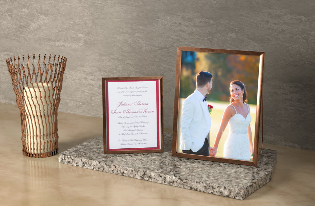 Bride and groom framed with their custom stationery
