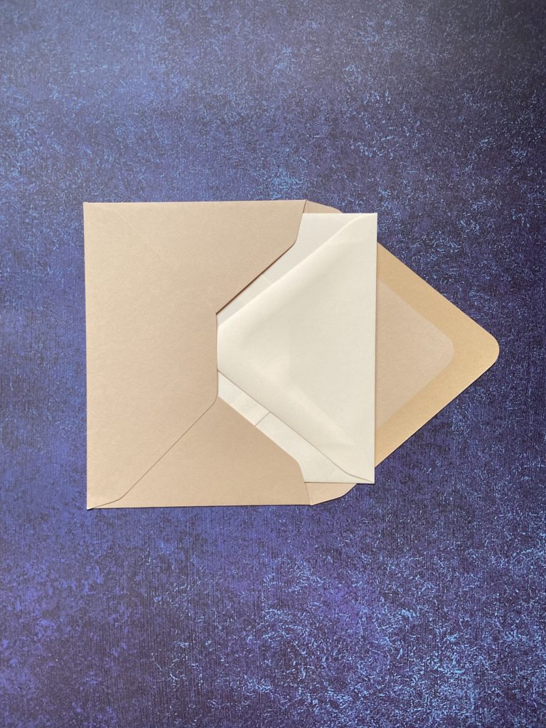 example of outer envelope with the inner envelope inside cream and tan