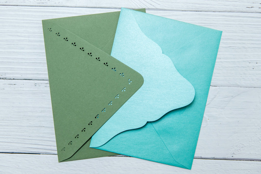 teal and green die cut envelopes