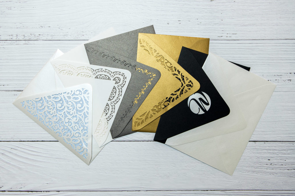 multiple different styles of die-cut envelopes