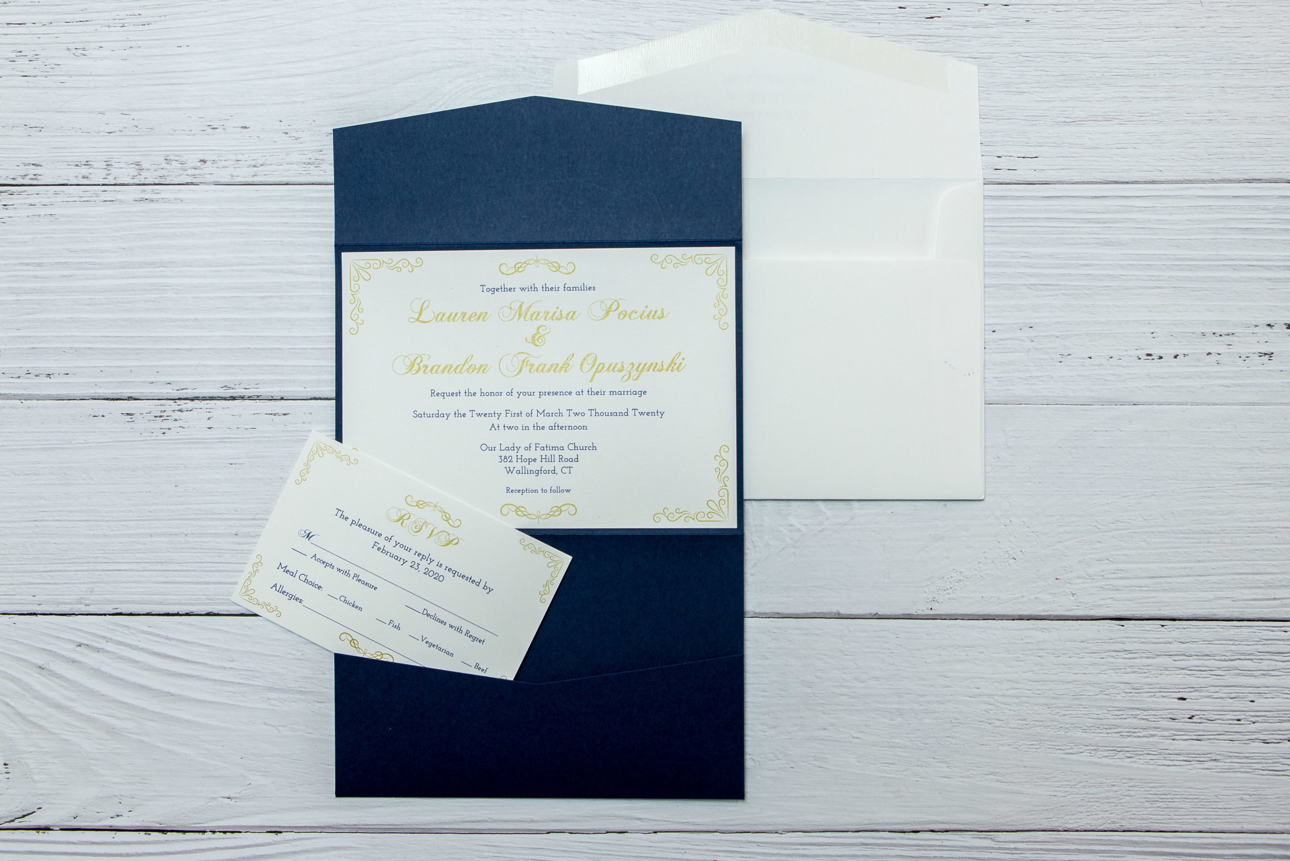 timeless invitations with navy and gold with cream pointed flap envelopes and navy pocket envelopes
