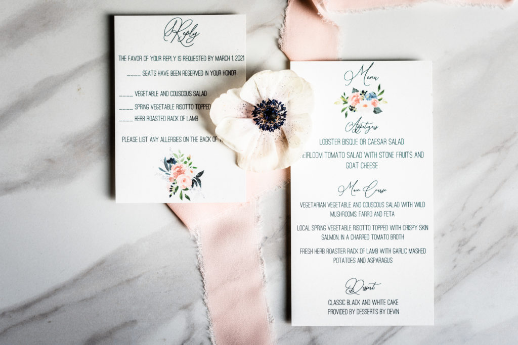 Floral stationery cards for invitation suite including a reply card and a menu. 